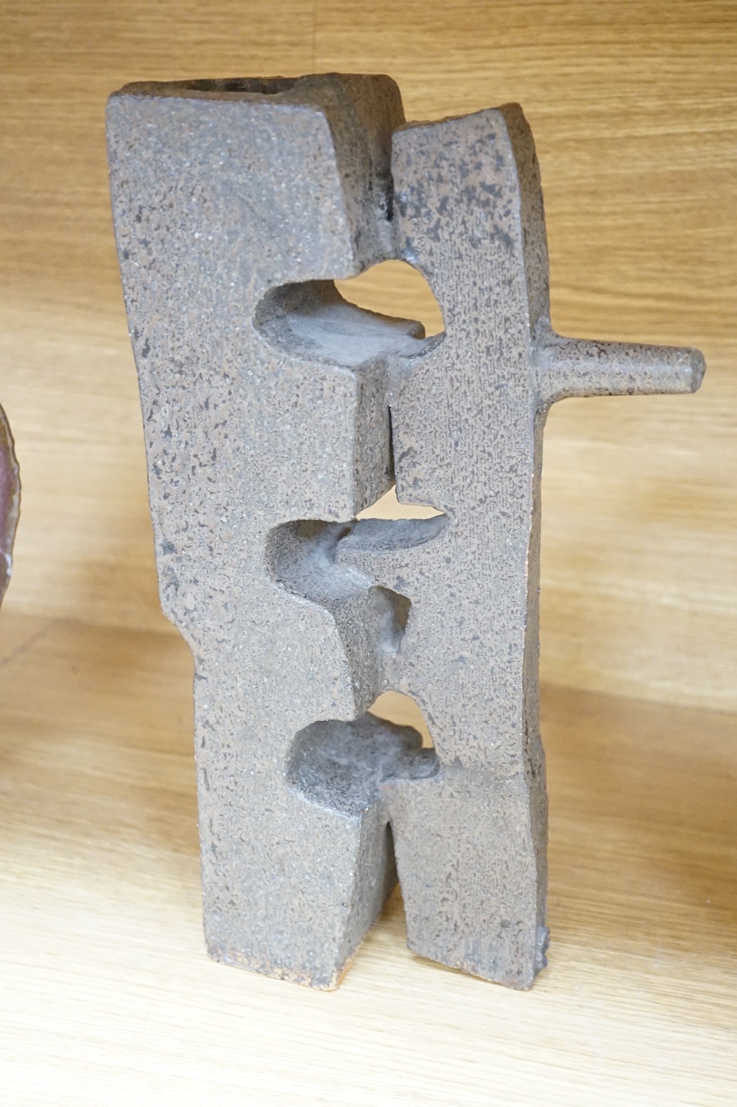 George Wilson (1924-2004), a studio pottery abstract winged vase, together with two Japanese abstract stoneware industrial form vases, two character impressed marks, tallest 35cms high